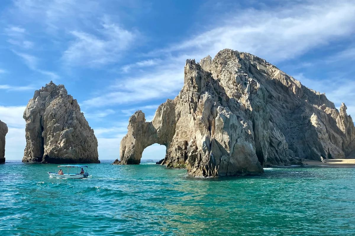 The Arch of Cabo San Lucas under a clear blue sky