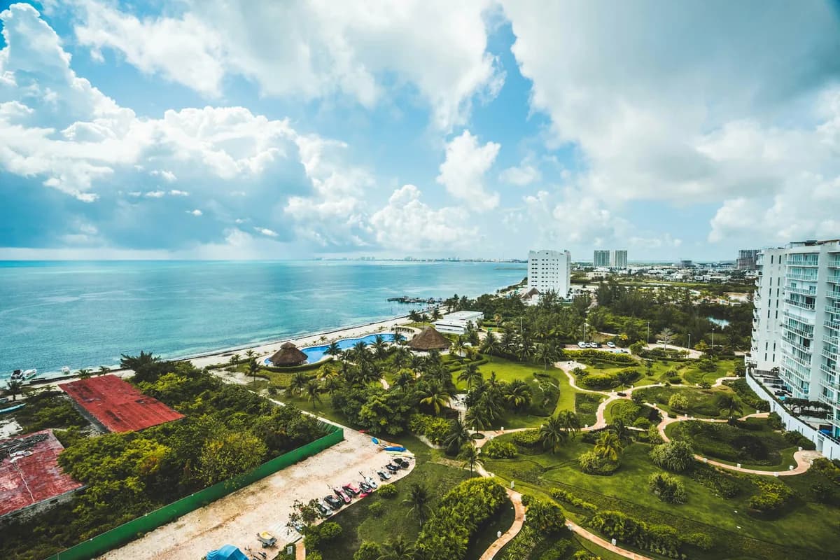 Aerial view of resorts and lagoon along the Cancun hotel zone