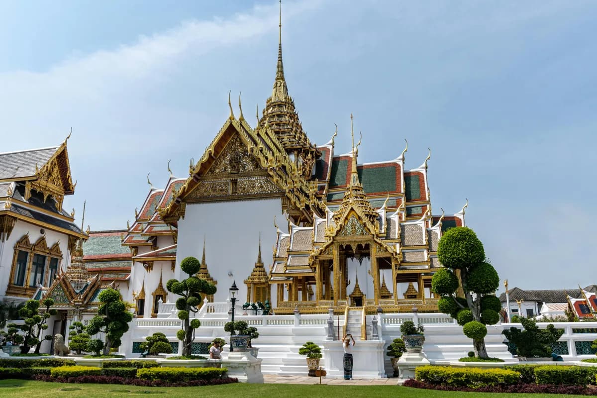 Ornate Chakri Maha Prasat Hall in the Grand Palace in Bangkok showcases exquisite Thai architecture.