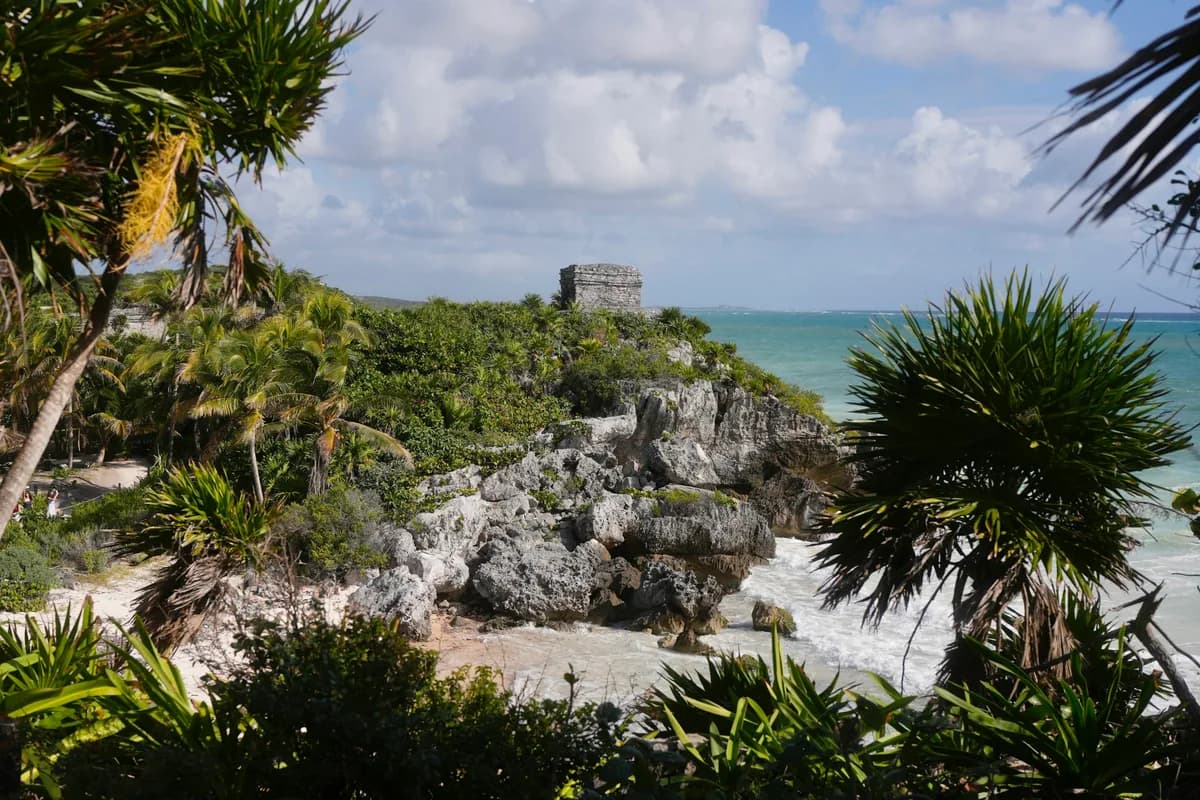 Ancient Maya ruins on a cliff overlooking the ocean at Tulum