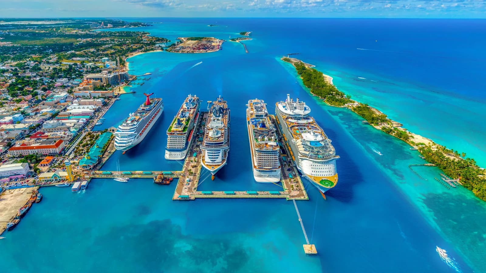 Aerial view of cruise ships docked at Nassau harbour, Bahamas, over turquoise water