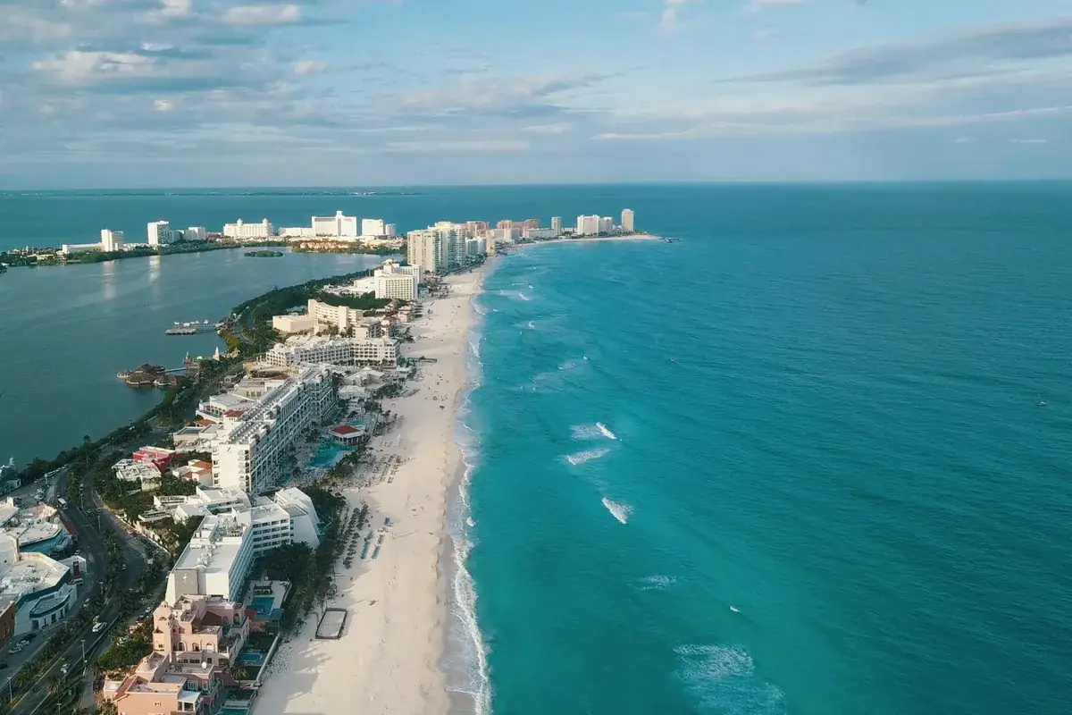 An aerial view of Cancun's Hotel Zone between the lagoon and the Caribbean Sea